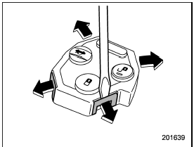 4. Open the transmitter case by releasing