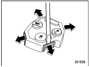 3. Open the transmitter case by releasing