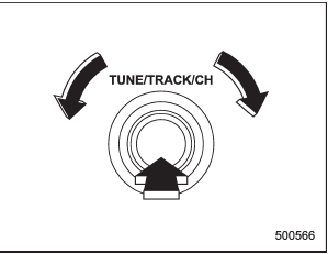 Turn the “TUNE/TRACK/CH” dial to select