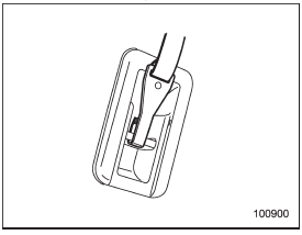 3. Fasten the top tether hook of the child