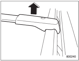 2. Carefully raise the crossbar from roof