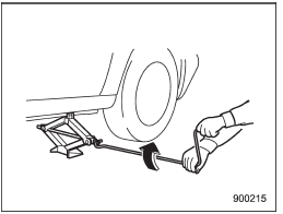 10. Insert the jack handle into the jackscrew,