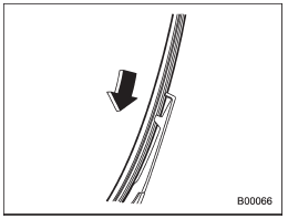 4. Align the claws of the plastic support