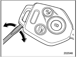 1. Open the key head using a flat-head