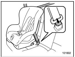 12. To remove the child restraint system,