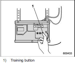 2. Press the training button on the