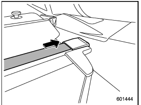 2. Push the cover housing to the right