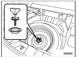 16. Store the flat tire in the spare tire