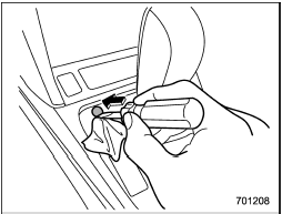 2. Wrap the tip of a flat-head screwdriver