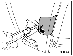 2. Cover the tip of a flat-head screwdriver