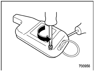 1. Remove the small phillips screw located