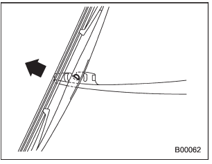 3. Pull the wiper blade assembly toward