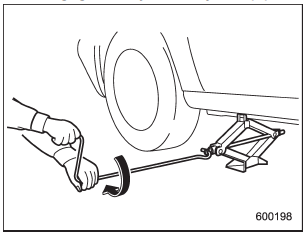 10. Insert the jack handle into the jackscrew,