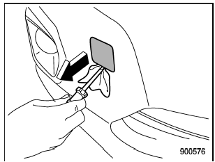 2. Cover the tip of a flat-head screwdriver